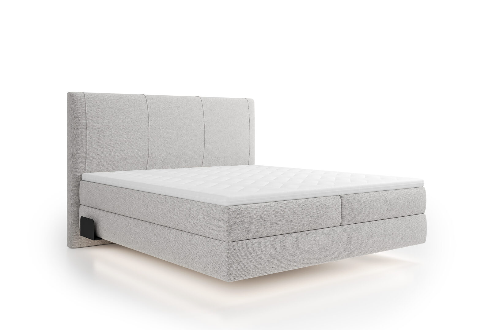 Lichtgrijze boxspring bed met gestoffeerd hoofdbord en matras, beschikbaar bij Belga Meubel in Brugge